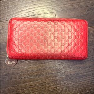 Authentic Gucci Red Guccissima Leather Zip Wallet | Heart Charm |
